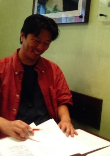 Томіока, Ацухіро